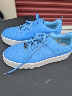 Nike Light Blue Low-Top Sneaker with Blue Swoosh